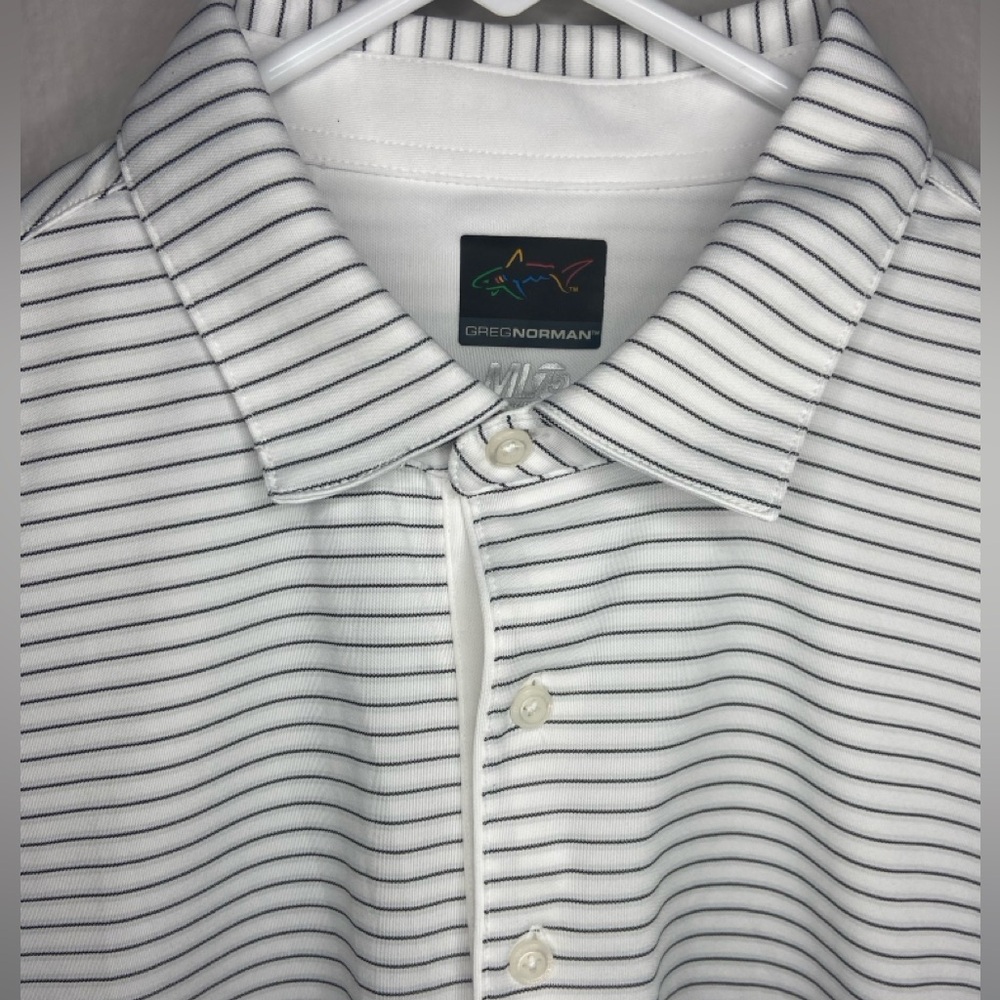 Greg Norman golf polo. Gray and white. Size Large